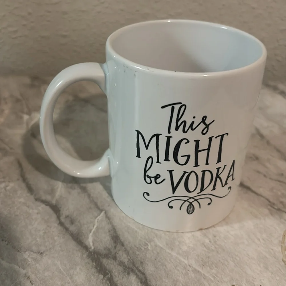 This might be vodka, coffee mug 14 ounce no chips, cracks or stains